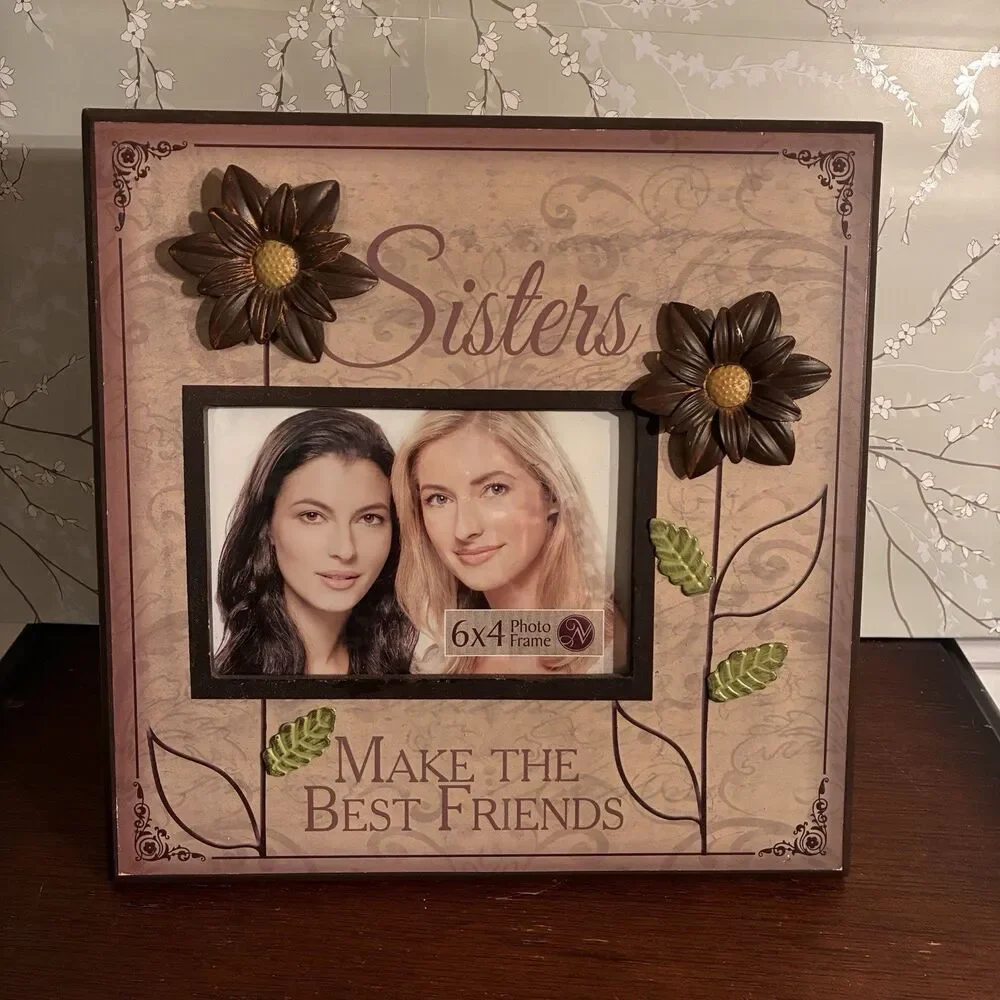 Picture Frame “SISTERS MAKE THE BEST FRIENDS” w/ Metal Flowers. 10”x10” Frame